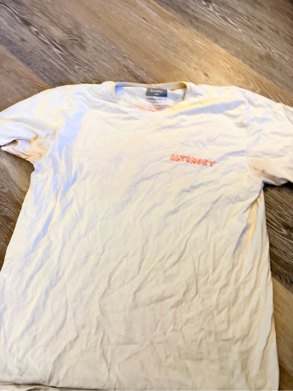 Altamont Cream Short Sleeve Tee with Orange Logo